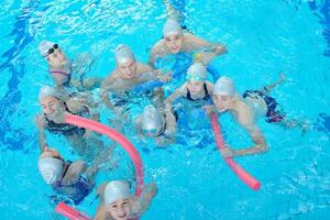 children group  at swimming pool photo