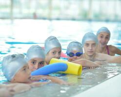 children group  at swimming pool photo