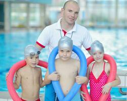 children group  at swimming pool photo