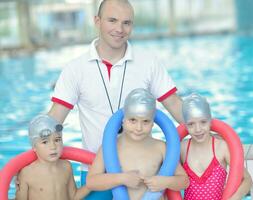 children group  at swimming pool photo