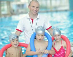 children group  at swimming pool photo