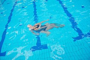 help and rescue on swimming pool photo