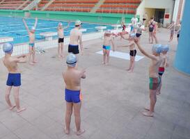 children group  at swimming pool photo