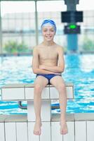 child portrait on swimming pool photo