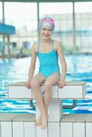 child portrait on swimming pool photo