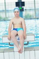 child portrait on swimming pool photo