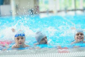 children group  at swimming pool photo