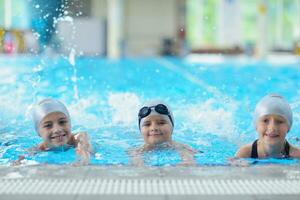 children group  at swimming pool photo