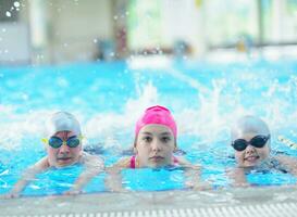 children group  at swimming pool photo