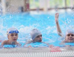 children group  at swimming pool photo