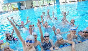 children group  at swimming pool photo