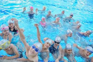 children group  at swimming pool photo