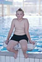 happy children group  at swimming pool photo