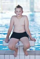 happy child on swimming pool photo