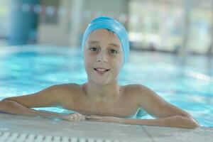 happy child on swimming pool photo