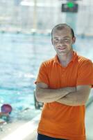 happy child group  at swimming pool photo