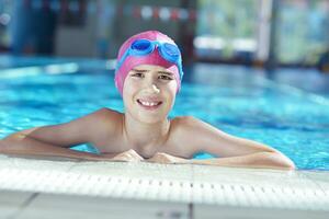 happy child on swimming pool photo