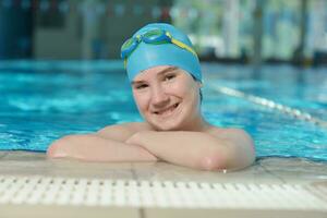 happy child on swimming pool photo