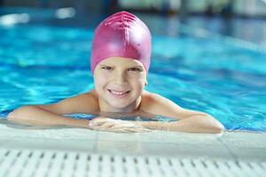 happy child on swimming pool photo