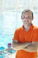 happy children group  at swimming pool photo