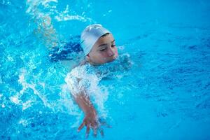 child on swimming poo photo