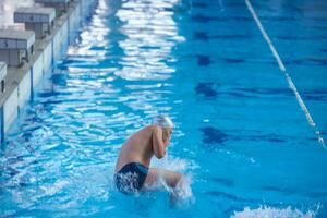 child portrait on swimming pool photo