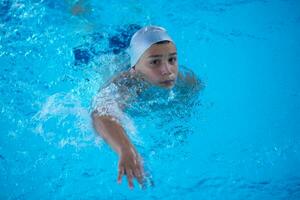 child on swimming poo photo