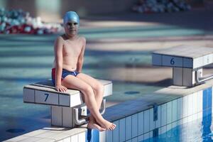 child group  at swimming pool school class photo