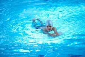 child on swimming poo photo