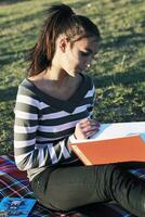 teen girl study outdoor photo