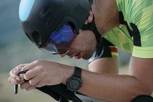 triathlon athlete riding bike photo