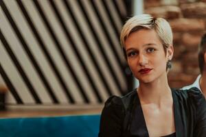 Pretty businesswoman, successful confidence in a modern coffe shop. Selective focus photo