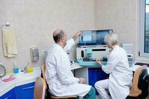 veterinarian and assistant in a small animal clinic photo