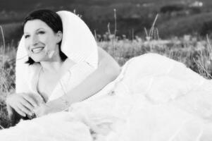 Beautiful bride outdoors in black and white photo