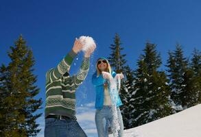 young couple on winter vacation photo