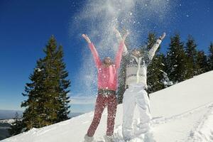 Young Couple In Winter  Snow Scene photo