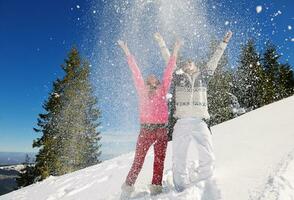 Young Couple In Winter  Snow Scene photo