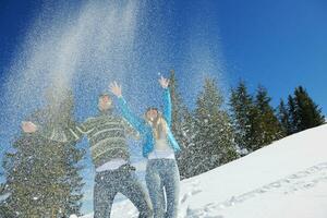 Young Couple In Winter  Snow Scene photo