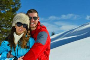 young couple on winter vacation photo