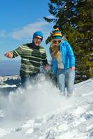 Young Couple In Winter  Snow Scene photo