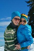 Young Couple In Winter  Snow Scene photo