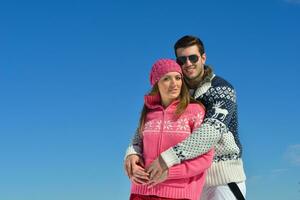 Young Couple In Winter  Snow Scene photo