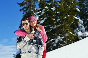 Young Couple In Winter  Snow Scene photo