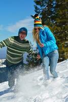 Young Couple In Winter  Snow Scene photo