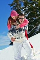 young couple on winter vacation photo