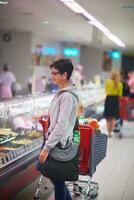 mother with baby in shopping photo