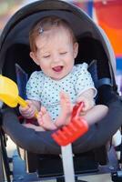 portrait of baby in carriage photo