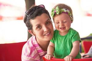 portrait of happy young mother and baby photo