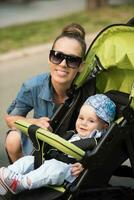 mother and baby in the park photo