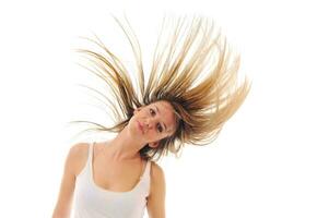 mujer de fiesta aislada con viento en el cabello foto